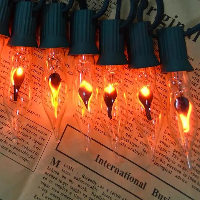 12.8Ft C7 Christmas Lights Flickering Flame String Lights with 12 Pack Clear Flame E12 Light Bulbs(2 Spare), Great for Christmas Decorations Indoor Outdoor Home Patio Party Lights, Green Wire by GreenHaven Gardens