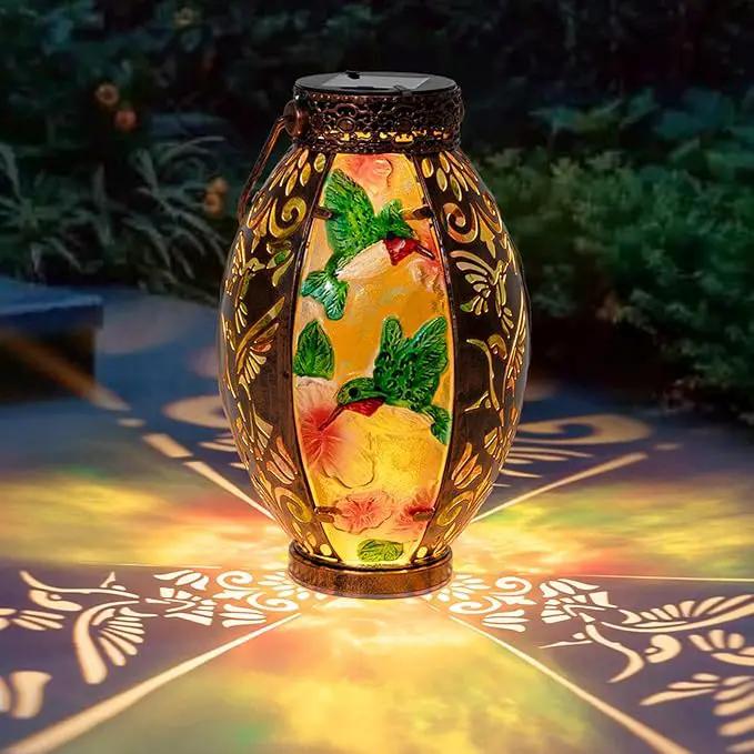 Hanging Solar Lantern Outdoor Waterproof Glass Solar Hummingbird Flickering Flame LED Garden Lights Metal Hollowed-Out Table Lamps Garden Decorations for Yard Patio Pathway Tabletop Tree Holiday by GreenHaven Gardens