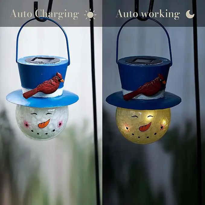 TERESA'S COLLECTIONS Outdoor Christmas Decorations for House, 36'' Snowman Glass Solar Lantern Stake with Blue Cardinal Hat, Xmas Grinch Solar Christmas Lights for Garden Party Decor by GreenHaven Gardens