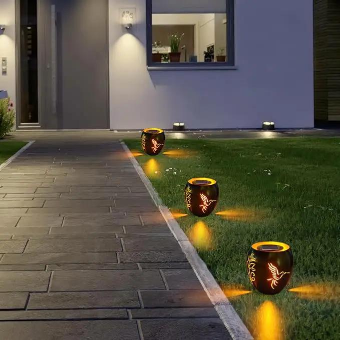 VEWOGARDEN Solar Lanterns Outdoor Waterproof Hummingbird & Plant Hollowed-Out Metal Lantern Solar Lights with Flickering Flame for Patio Porch Table, Green by GreenHaven Gardens