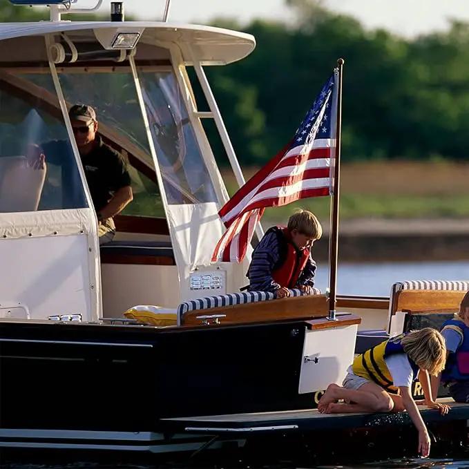 AZCOVER American Flag 16x24 Inch Boat Flag for Outside Made in USA Heavy Duty Nylon American Flags for Outdoor with Embroidered Stars Sewn Stripes and Brass Grommets All Weather Lasting United States by GreenHaven Gardens