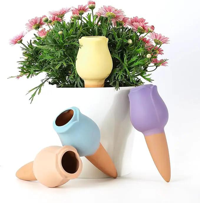 WILDKEN Terracotta Watering Spikes, 4 Pack Tulip Shaped Plant Watering Globes Vacation Self-Watering Planters Devices for Indoor and Outdoor Plants by GreenHaven Gardens