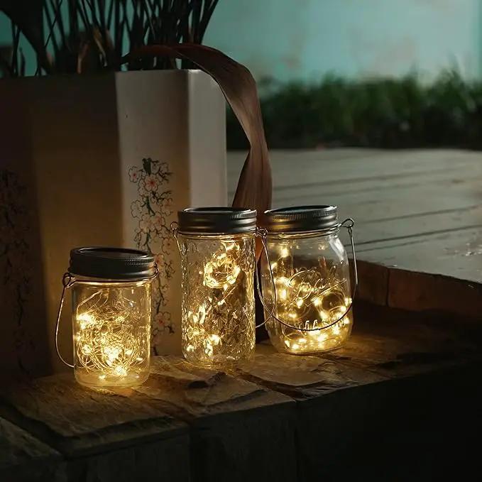 Decorman Solar Mason Jar Lights, 4 Pack 30 LED Fairy Star Firefly String Lids Lights with 4 Hangers for Patio Yard Garden Party Wedding Christmas Decoration(Jars Not Included) (4 Pack, Warm White) by GreenHaven Gardens
