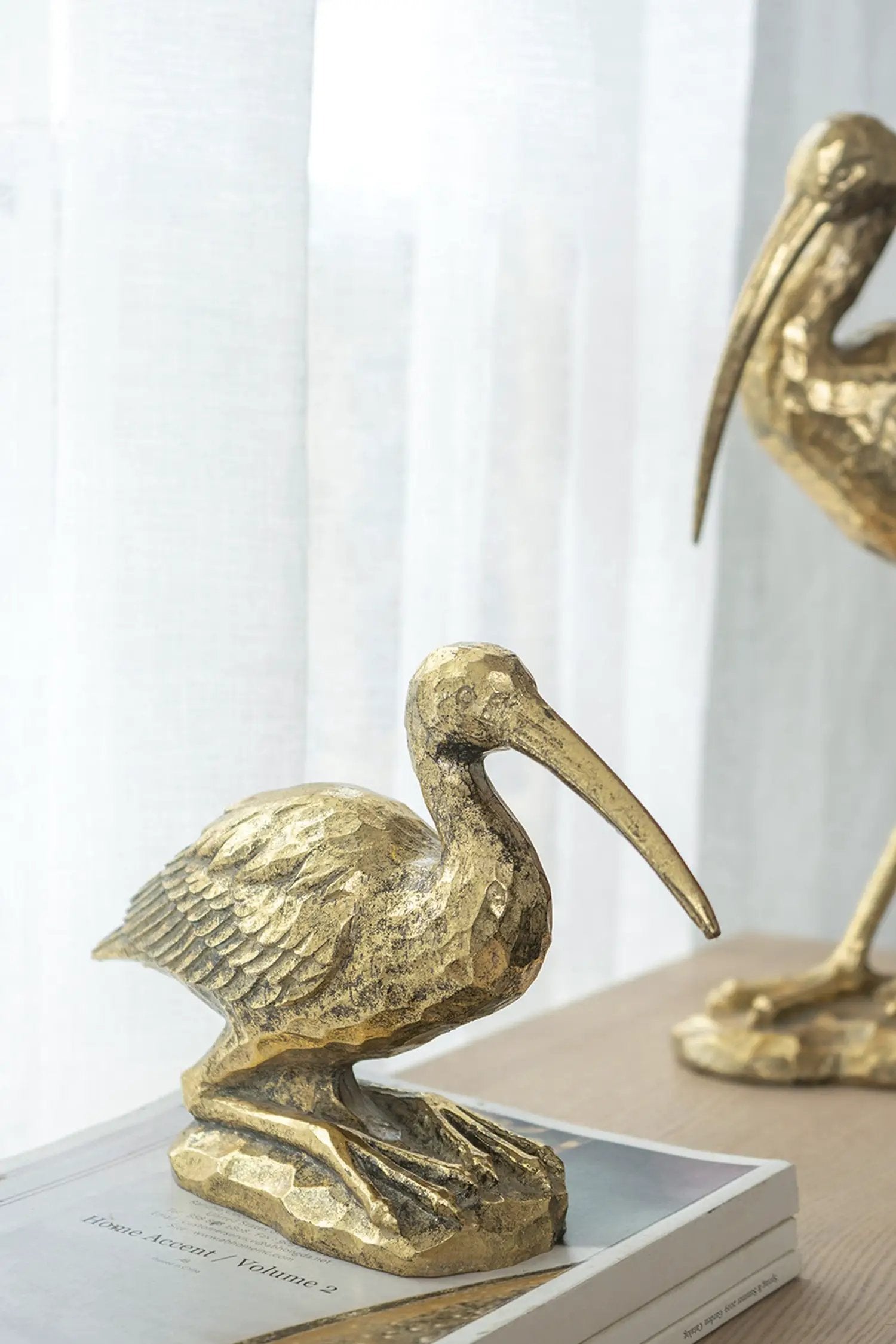 7.1x10.4x3" Kneeling Crane Figurine by HouseOfZazla
