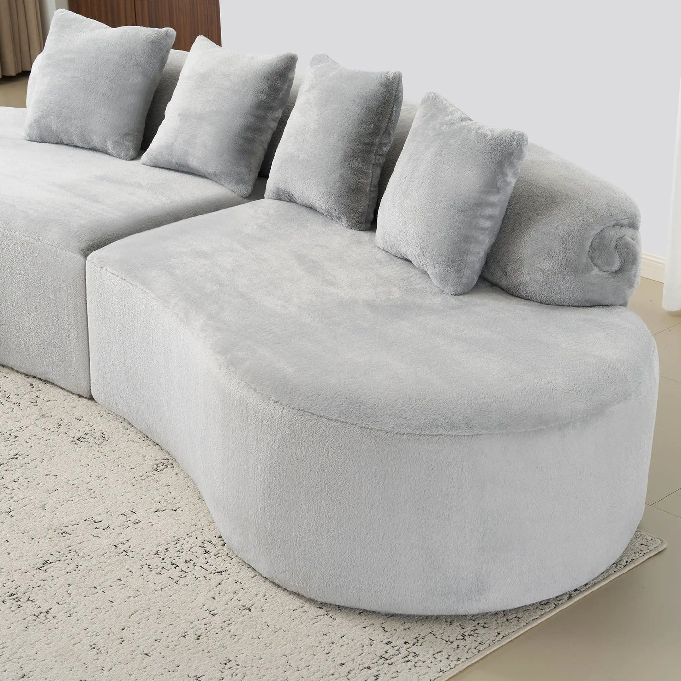 Modern Curved Sofa With Pillows by Unique Piece Furniture