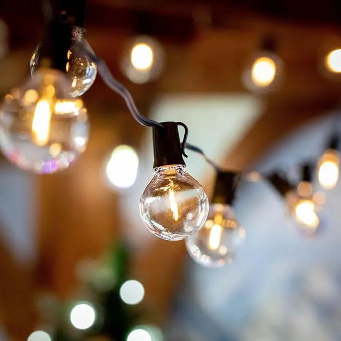 Novelty Lights 100 Feet G40 LED Patio String Lights with 67 Bulbs, Warm White, Weather Resistant and Shatterproof Replaceable Plastic Globe Bulbs, Black Wire by GreenHaven Gardens