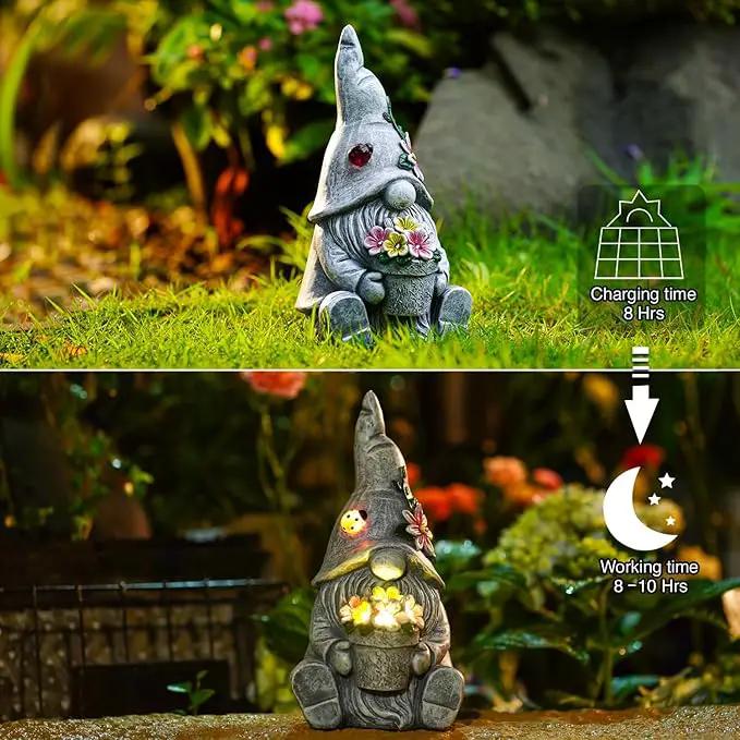 Goodeco Sitting Gnome Holding Flower Statue - Solar Garden Gnomes Decor for Outside with LED Lights, for Women or Moms, Housewarming Gnome Decorations by GreenHaven Gardens