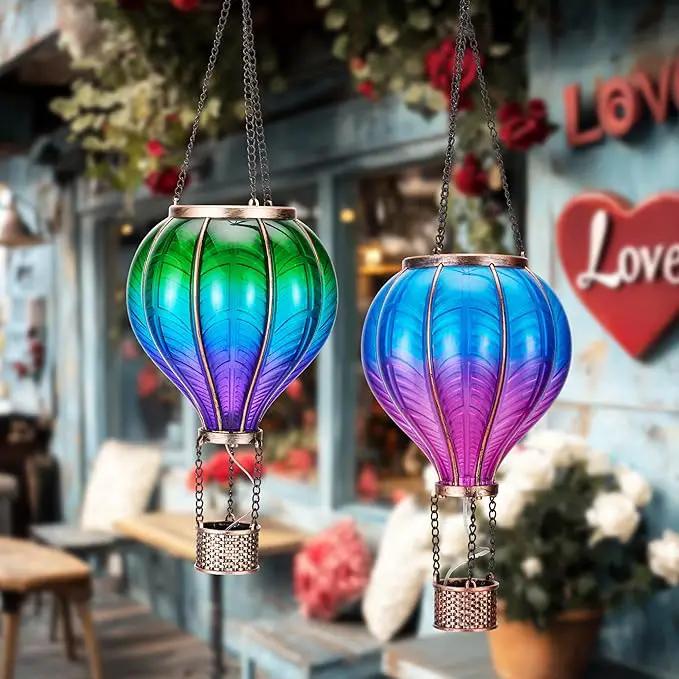 TERESA'S COLLECTIONS 2 Pack Hanging Solar Lantern Outdoor Garden Decor for Valentine ,Waterproof Plastic Hot Air Balloon Green Flickering Flame Effect Lantern for Yard Tree ,18" by GreenHaven Gardens