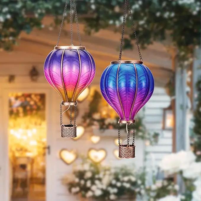 TERESA'S COLLECTIONS 2 Pack Hanging Solar Lantern Outdoor Garden Decor for Valentine ,Waterproof Plastic Hot Air Balloon Purple Flickering Flame Effect Lantern for Yard Tree Gift for Mom,18" by GreenHaven Gardens