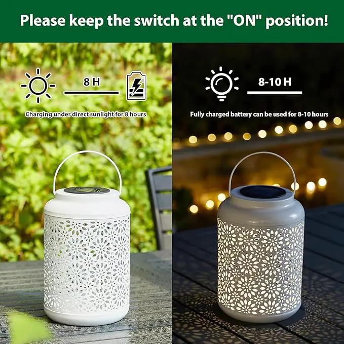 Glitzhome Solar Lantern White Metal Cutout Flower Outdoor Hanging Solar Light with Handle for Garden Patio Yard Outdoor Decor by GreenHaven Gardens