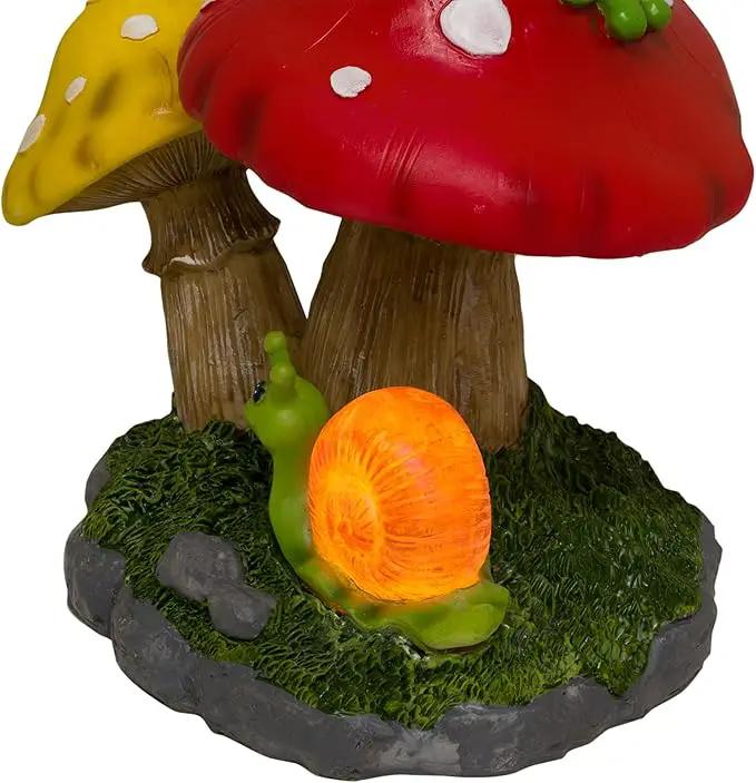Alpine Corporation ZEN390SLR-S Frog on Mushroom Statue with LED Lights, Solar-Powered LED Frog Garden Statue, 12" H, Green by GreenHaven Gardens