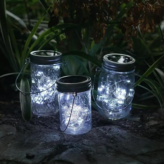 Decorman Solar Mason Jar Lights, 4 Pack 30 LED Fairy Star Firefly String Lids Lights with 4 Hangers for Patio Yard Garden Party Wedding Christmas Decoration(Jars Not Included) (4 Pack, Cool White) by GreenHaven Gardens