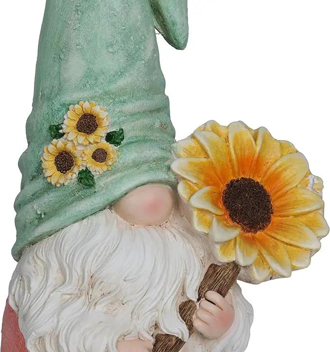 Alpine Corporation MCC842 Indoor/Outdoor Gnome Holding Sunflower Garden Statue, Charming Gnome Statue w/Hat, 21" H, Turquoise by GreenHaven Gardens