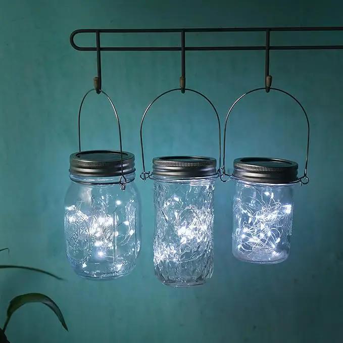 Decorman Solar Mason Jar Lights, 4 Pack 30 LED Fairy Star Firefly String Lids Lights with 4 Hangers for Patio Yard Garden Party Wedding Christmas Decoration(Jars Not Included) (4 Pack, Cool White) by GreenHaven Gardens