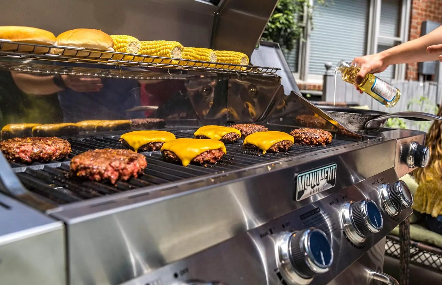 Monument Grills Larger 4+2 Burner Propane Gas Grills Stainless Steel Cabinet Style with Side & Side Sear Burners, Built-In Thermometer, and Knob Controls by GreenHaven Gardens