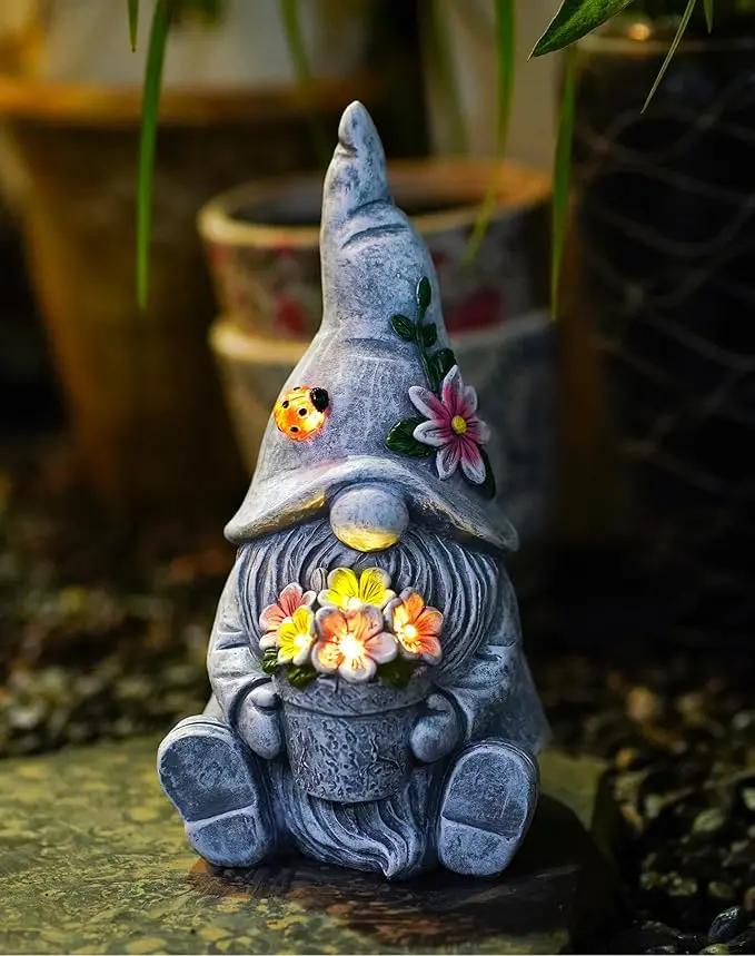 Goodeco Sitting Gnome Holding Flower Statue - Solar Garden Gnomes Decor for Outside with LED Lights, for Women or Moms, Housewarming Gnome Decorations by GreenHaven Gardens