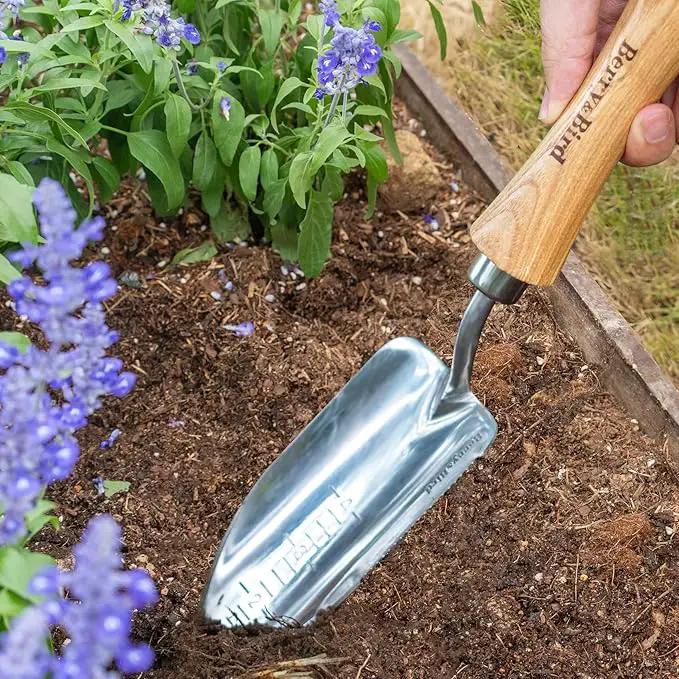 Berry&Bird Potting Trowel, Stainless Steel Serrated Hand Shovel, Wood Handle Garden Trowel Tool with Measuring Scale for Effortless Digging,Roots，Planting, Cutting and Transplanting by GreenHaven Gardens