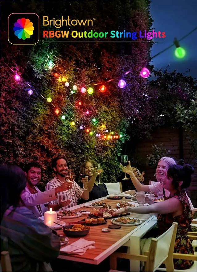 Brightown RGBW Outdoor String Lights, 58FT LED Patio Lights with Remote and Timer, Commercial Grade Waterproof Hanging Lights with 27 Shatterproof Bulbs(2 Spare) for Backyard Porch Garden Party Decor by GreenHaven Gardens
