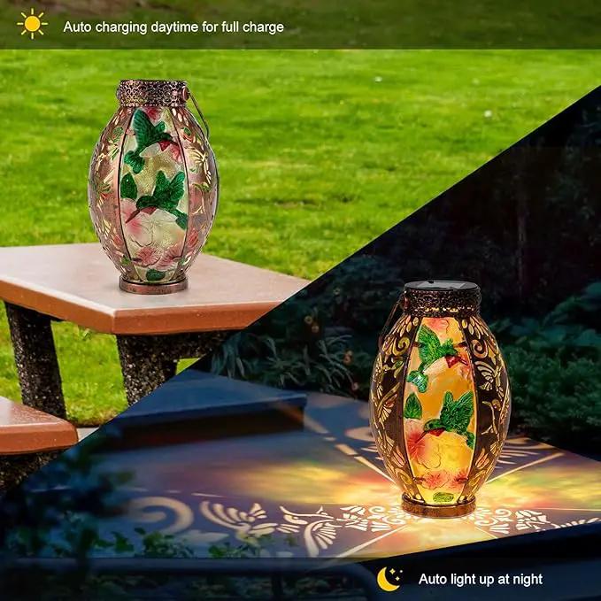 Hanging Solar Lantern Outdoor Waterproof Glass Solar Hummingbird Flickering Flame LED Garden Lights Metal Hollowed-Out Table Lamps Garden Decorations for Yard Patio Pathway Tabletop Tree Holiday by GreenHaven Gardens