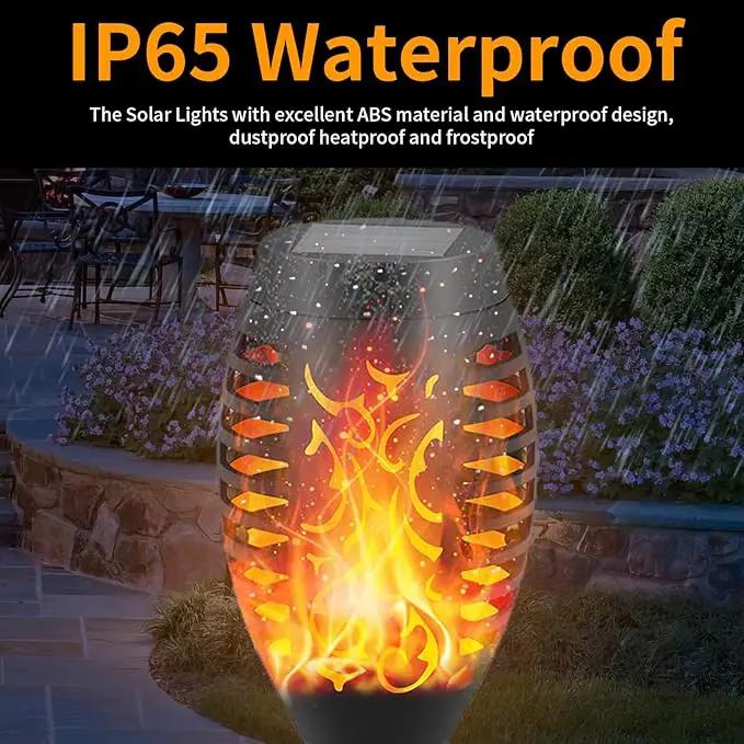 12-Pack Solar Flickering Flame Torches – Waterproof Solar Garden Lights, Outdoor Solar Lights for Yards, and Flame Torches for Patio and Pathway Decorations by GreenHaven Gardens