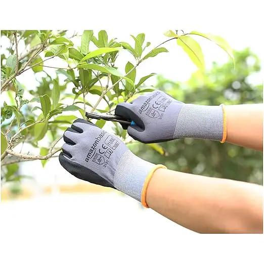 Amazon Basics Micro-Foam Nitrile Coated Work Gloves, Nylon Liner Fiber, Touch Screen, Grey, 11/XXL, 12-Pair by GreenHaven Gardens