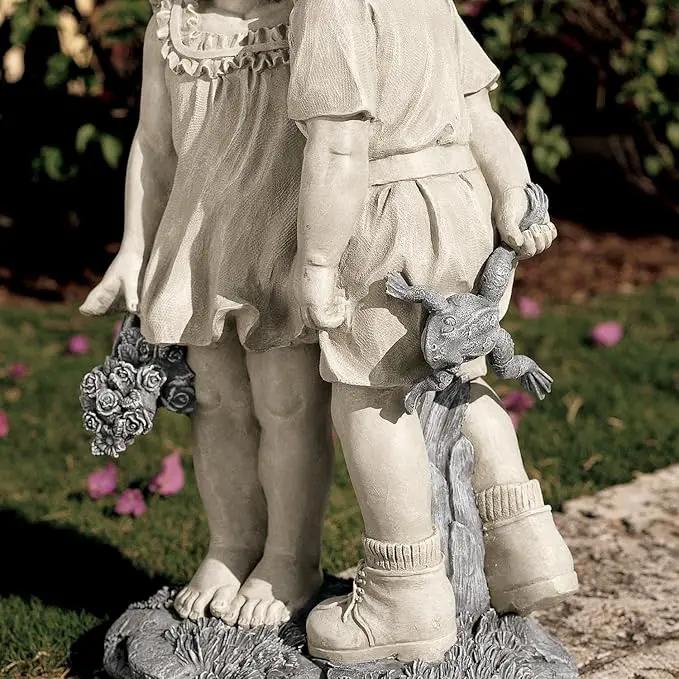 Young Sweethearts: Kissing Children Garden Statue by GreenHaven Gardens