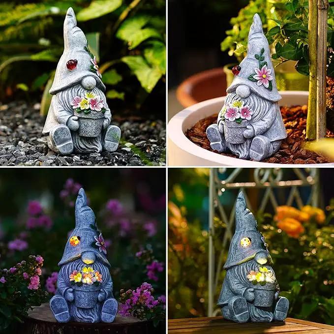 Goodeco Sitting Gnome Holding Flower Statue - Solar Garden Gnomes Decor for Outside with LED Lights, for Women or Moms, Housewarming Gnome Decorations by GreenHaven Gardens