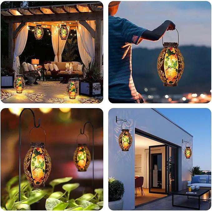 Hanging Solar Lantern Outdoor Waterproof Glass Solar Hummingbird Flickering Flame LED Garden Lights Metal Hollowed-Out Table Lamps Garden Decorations for Yard Patio Pathway Tabletop Tree Holiday by GreenHaven Gardens