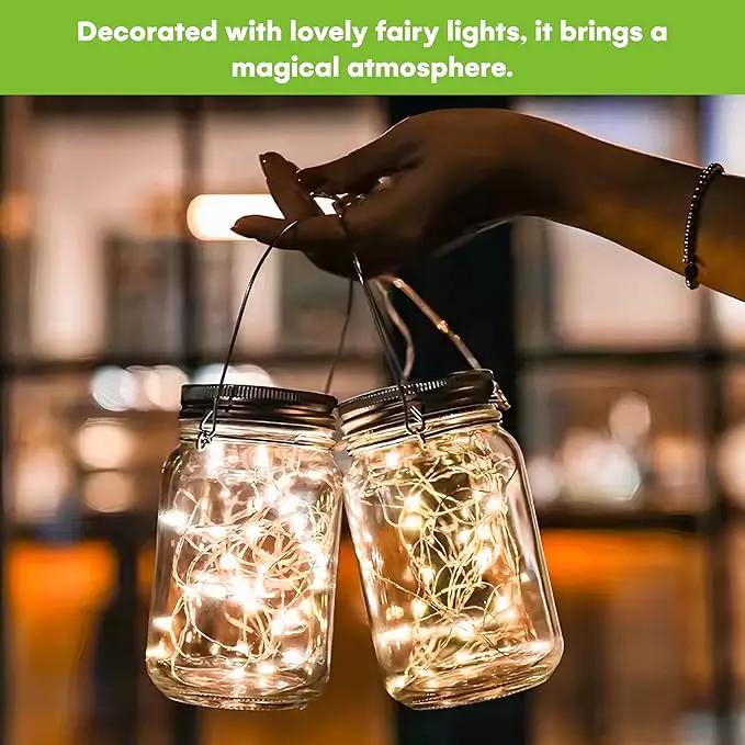 SteadyDoggie Solar Mason Jar Lights - Set of 2 Magical Patio Lights in Glass Lanterns - Hang Them Anywhere Outdoors for Enchanting Illumination - Waterproof and Decorative - 5.2" x 3" by GreenHaven Gardens