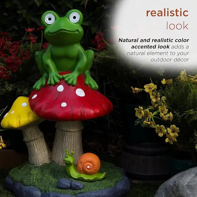 Alpine Corporation ZEN390SLR-L Frog on Mushroom Statue with LED Lights, Solar-Powered LED Frog Garden Statue, 24" H, Green by GreenHaven Gardens