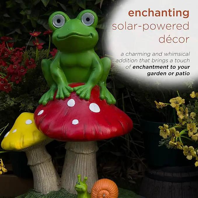 Alpine Corporation ZEN390SLR-L Frog on Mushroom Statue with LED Lights, Solar-Powered LED Frog Garden Statue, 24" H, Green by GreenHaven Gardens