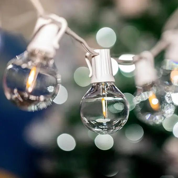 Novelty Lights 100 Feet G40 LED Patio String Lights with 67 Bulbs, Warm White, Weather Resistant and Shatterproof Replaceable Plastic Globe Bulbs, White Wire by GreenHaven Gardens