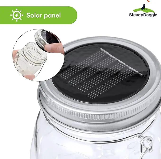 SteadyDoggie Solar Mason Jar Lights - Set of 2 Magical Patio Lights in Glass Lanterns - Hang Them Anywhere Outdoors for Enchanting Illumination - Waterproof and Decorative - 5.2" x 3" by GreenHaven Gardens