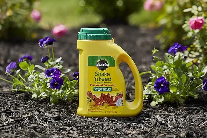 Miracle-Gro Shake 'N Feed All Purpose Plant Food Plus Weed Preventer1, Prevents Crabgrass, Common Chickweed and Common Purslane in Gardens, 4.5 lb. by GreenHaven Gardens