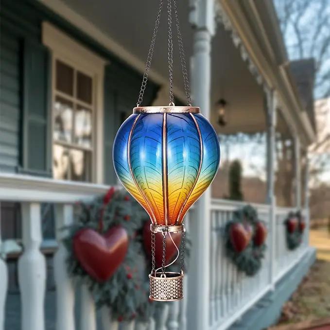 TERESA'S COLLECTIONS Hot Air Balloon Solar Lantern for Garden Decor ,Flickering Flame Hanging Solar Light for Outdoor ,Blue & Yellow Plastic Lamp for Yard Tree Gift for Mom by GreenHaven Gardens