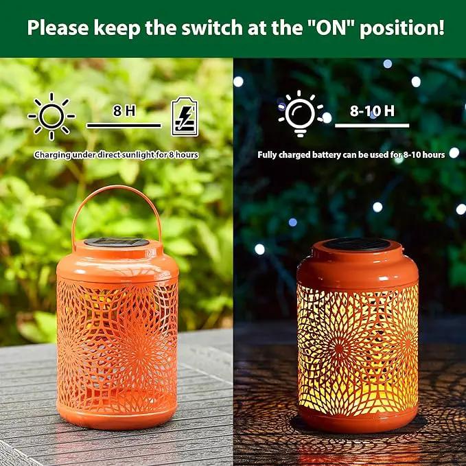 Glitzhome Solar Lantern Orange Metal Cutout Scrollwork Outdoor Hanging Solar Light with Handle for Garden Patio Yard Outdoor Decor by GreenHaven Gardens