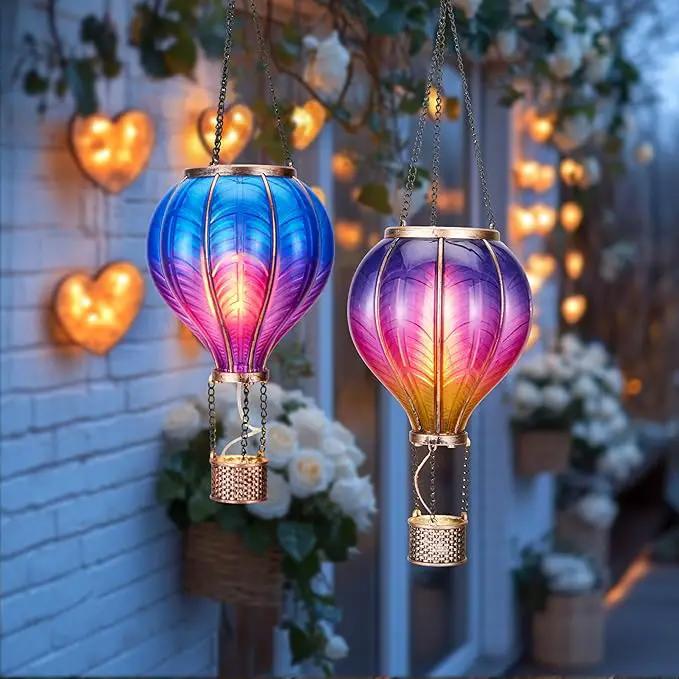 TERESA'S COLLECTIONS 2 Pack Hanging Solar Lantern Outdoor Garden Decor for Valentine ,Waterproof Plastic Hot Air Balloon Purple Flickering Flame Effect Lantern for Yard Tree Gift for Mom,18" by GreenHaven Gardens