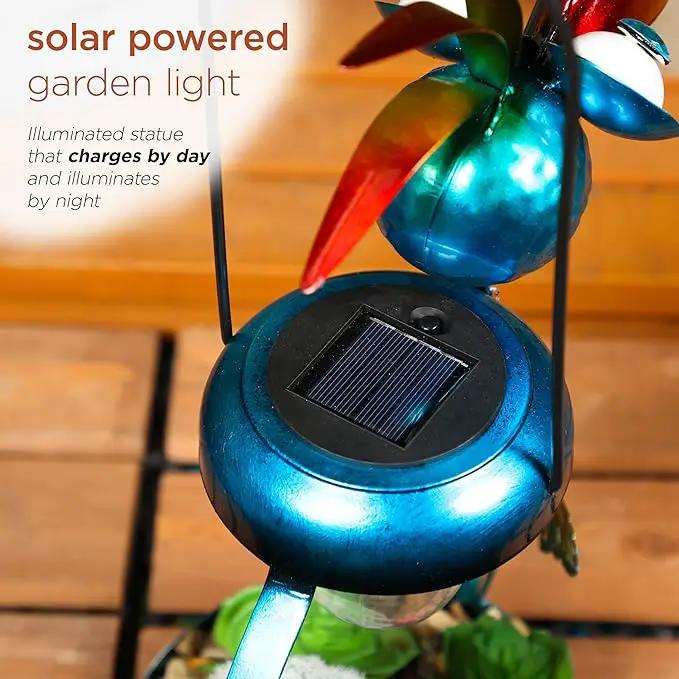 Alpine Corporation LYT290SLR-HH Solar-Powered Metal Flamingo with Garden Enclosed LED Light, Solar Patio Decor, 16''H, Blue by GreenHaven Gardens