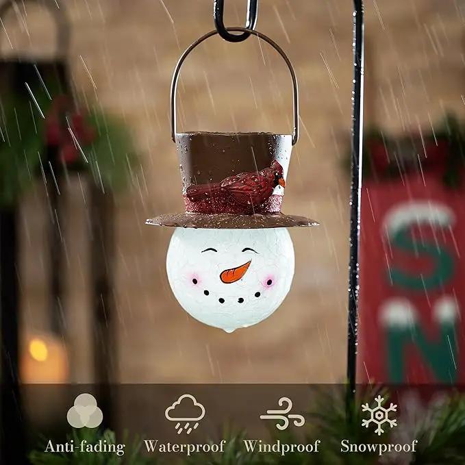 TERESA'S COLLECTIONS Outdoor Christmas Decorations for House, 36'' Snowman Glass Solar Lantern Stake with Brown Cardinal Hat, Xmas Grinch Solar Christmas Lights for Garden Party Decor by GreenHaven Gardens