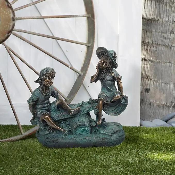 Alpine Corporation 14" Tall Indoor/Outdoor Girl and Boy Playing on Teeter Totter Statue Yard Art Decoration by GreenHaven Gardens