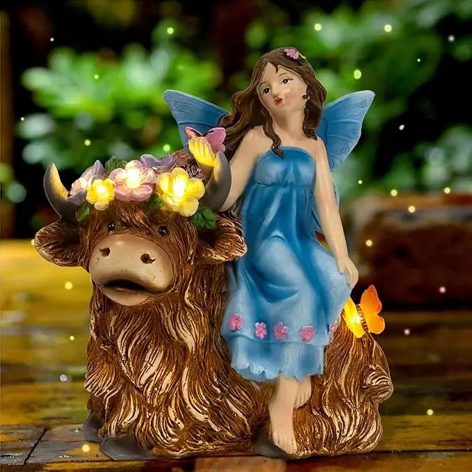 Solar Angel Garden Statue - Garden Fairy Sitting on a Highland Cow with Flowers, Butterflies and 5 LED Lights - Decorate Table, Terrace, Lawn, Birthdays, Grandma, mom by GreenHaven Gardens