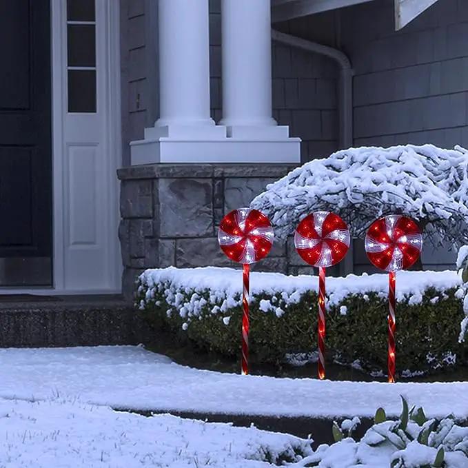 Alpine Corporation 28" H Outdoor Candy Cane Yard Stakes with Red and White LED Lights (Set of 3), Christmas Decoration by GreenHaven Gardens