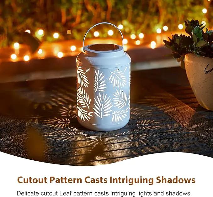 Glitzhome Solar Lantern White Metal Cutout Leaf Outdoor Hanging Solar Light with Handle for Garden Patio Yard Outdoor Decor by GreenHaven Gardens
