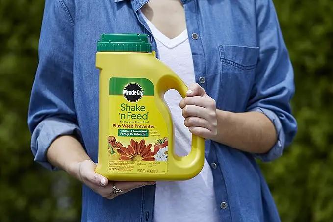 Miracle-Gro Shake 'N Feed All Purpose Plant Food Plus Weed Preventer1, Prevents Crabgrass, Common Chickweed and Common Purslane in Gardens, 4.5 lb. by GreenHaven Gardens