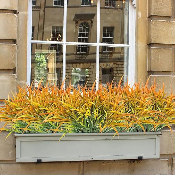 Ouddy Decor 16 Bundles Artificial Fall Plants Outdoor Fake Grass Stems UV Resistant Faux Plastic Plants Shrubs for Autumn Home Garden Pathway Farmhouse Front Porch Harvest Thanksgiving Decor, Orange by GreenHaven Gardens