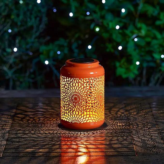 Glitzhome Solar Lantern Orange Metal Cutout Scrollwork Outdoor Hanging Solar Light with Handle for Garden Patio Yard Outdoor Decor by GreenHaven Gardens