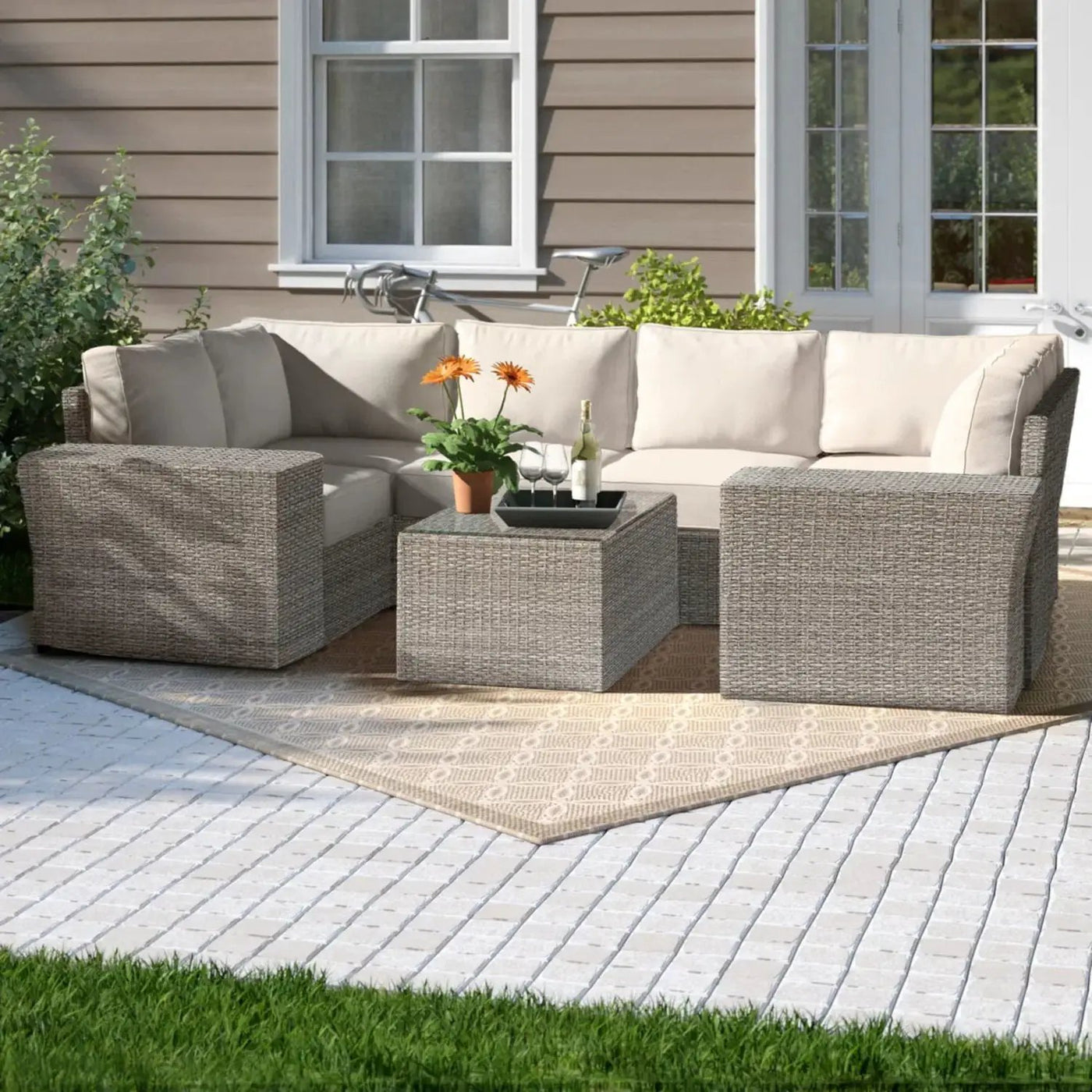 Outdoor Wicker Sectional With Weather Resistant Cushions And Table by HouseOfZazla