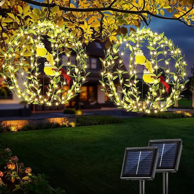 Joomer Solar Lights Outdoor, 2 Pack 12in 120 LED Solar Hanging Light Balls Outdoor, 8 Modes Waterproof Foldable Metal Sphere Light with Hook for Outside Hanging - Warm White(Ball with Green Leaf+Bird) by GreenHaven Gardens