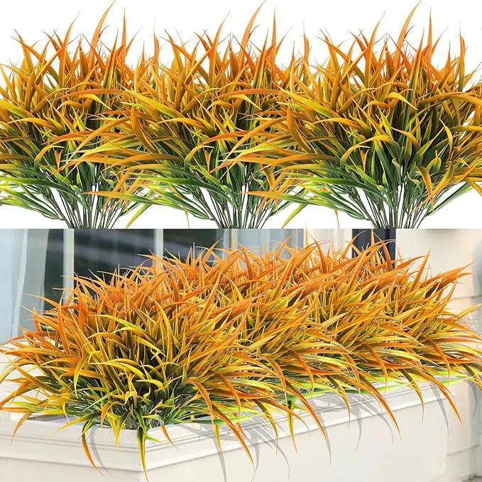 Ouddy Decor 16 Bundles Artificial Fall Plants Outdoor Fake Grass Stems UV Resistant Faux Plastic Plants Shrubs for Autumn Home Garden Pathway Farmhouse Front Porch Harvest Thanksgiving Decor, Orange by GreenHaven Gardens