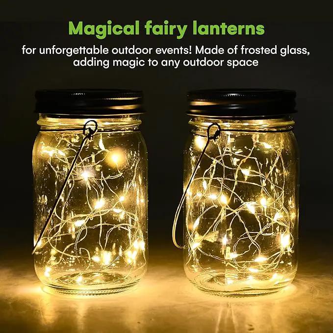 SteadyDoggie Solar Mason Jar Lights - Set of 2 Magical Patio Lights in Glass Lanterns - Hang Them Anywhere Outdoors for Enchanting Illumination - Waterproof and Decorative - 5.2" x 3" by GreenHaven Gardens